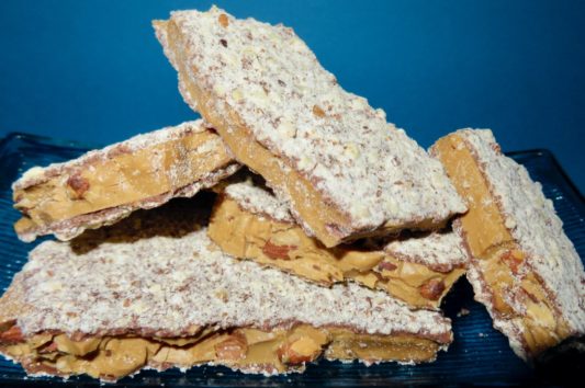 dish of gourmet almond butter toffee