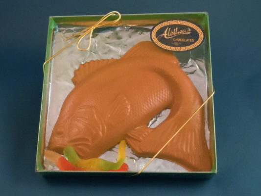 large chocolate fish with gummy worm bait in gift box