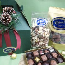 decorated holiday handle box filled with artisan chocolate confections