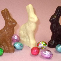 Premium chocolate sitting Bunnies in 3 flavors with chocolate foiled eggs