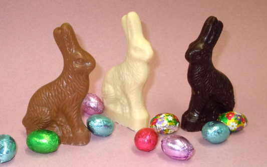 Premium chocolate sitting Bunnies in 3 flavors with chocolate foiled eggs