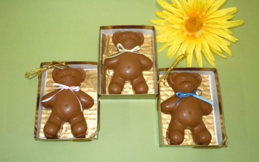 Adorable Chocolate Teddy Bear with a pastel ribbon