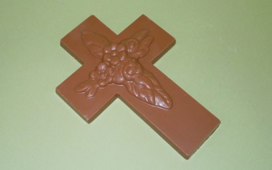 Beautiful floral embossed cross molded from premium chocolate