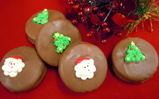 Delicious chocolate drenched Oreo Cookies decorated for the Holidays