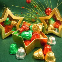 Charming gold Star Boxes filled with gourmet Chocolate bells