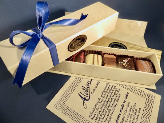 six Artisan truffles in a beautiful snap close gift box