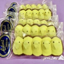 Rows of Marshmallow Peeps with Muddy chocolate feet