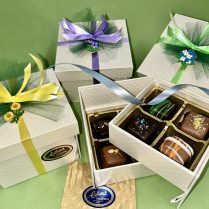 beautiful two tiered box of Artisan Truffles decorated for Spring