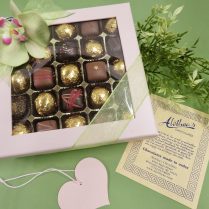 Two tiered box of Artisan Chocolates decorated for Mother's Day.