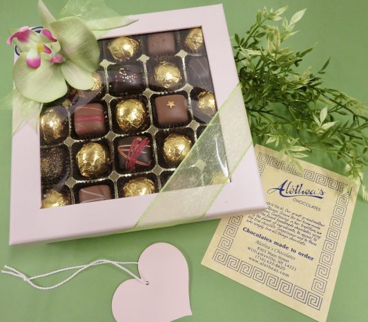 Two tiered box of Artisan Chocolates decorated for Mother's Day.