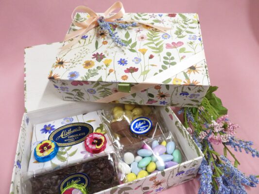 beautiful floral gift box packed with gourmet Spring confections