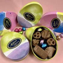 Easter egg shaped box holding artisan chocolate snack items
