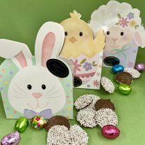 whimsical Easter boxes filled with NonPareils and chocolate eggs